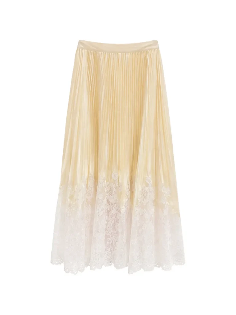 Long pale yellow maxi skirt with a lace-trimmed hem.
