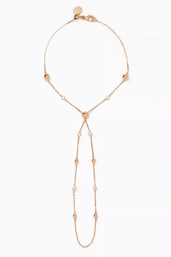 noora-shawqi-enishi-diamond-hand-chain-in-18kt-rose-gold - Soigné Middle East