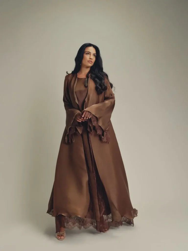 A model wearing an abaya by Al Mraikn