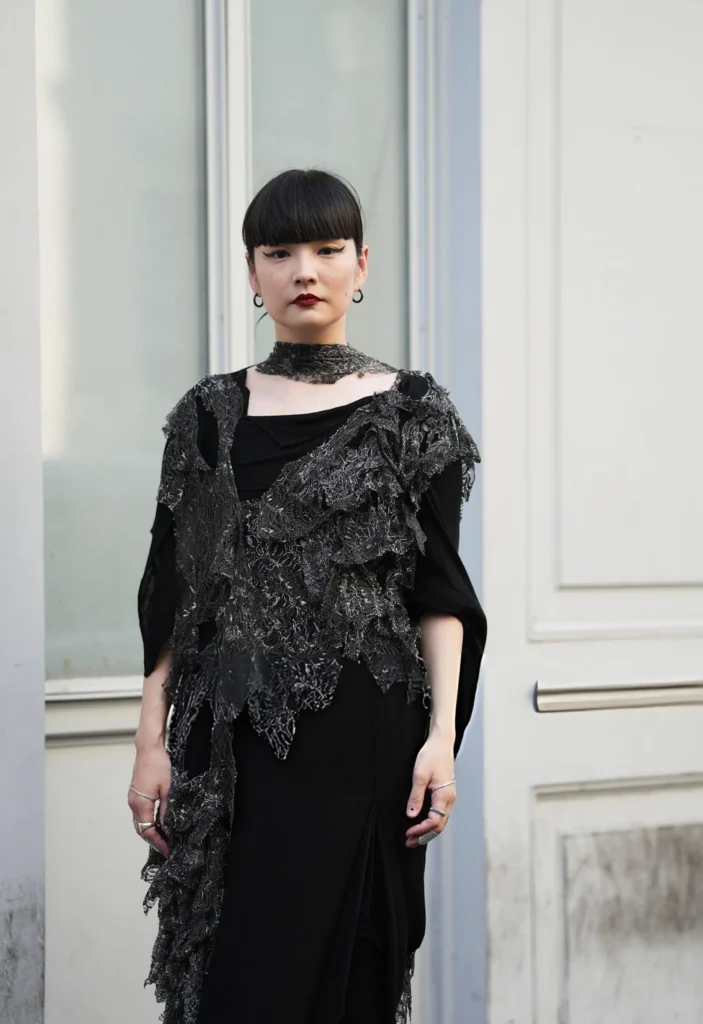 A guest attending Yohji Yamamoto SS27