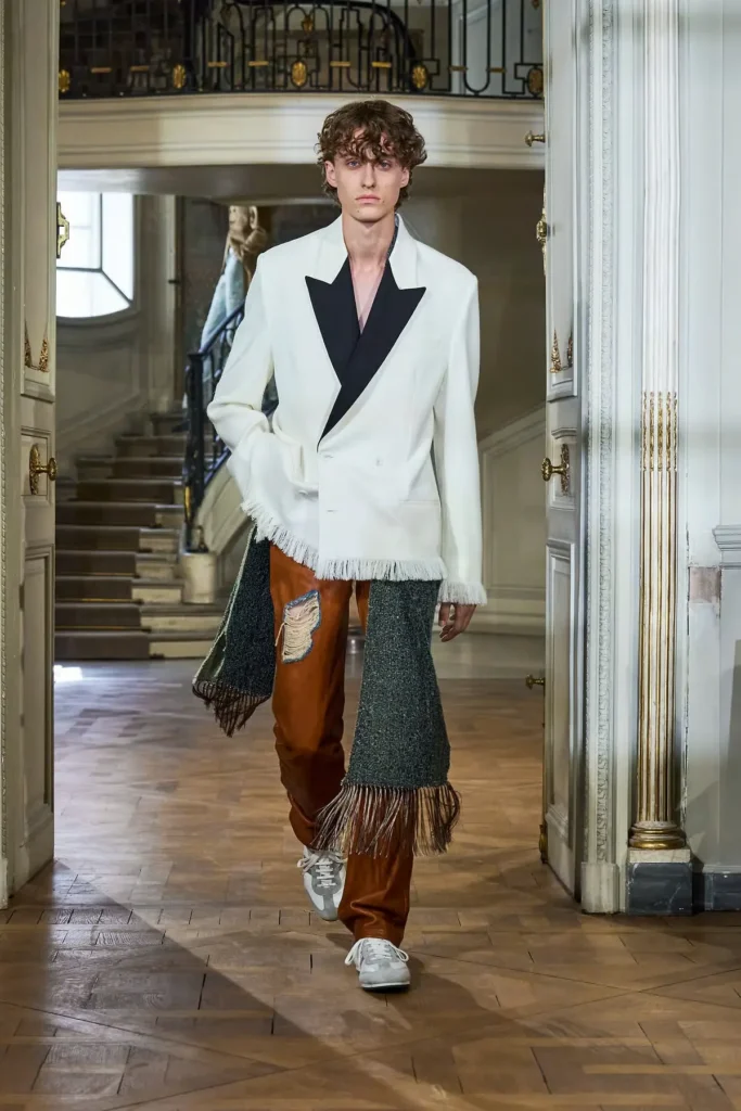 Image of a model walking the Dior Homme SS27 show