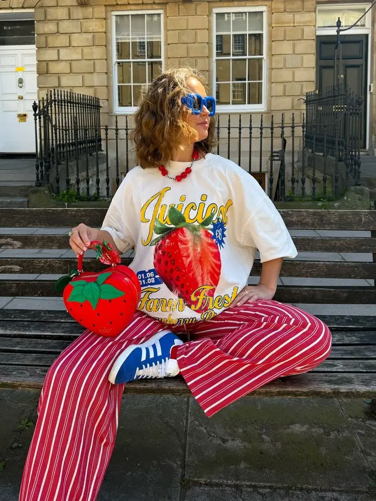 Woman in a strawberry themed outfit
