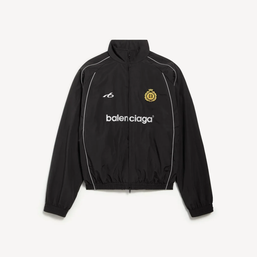 A product image of the Men's Soccer Tracksuit Jacket in Black by Balenciaga for the FIFA fashion guide