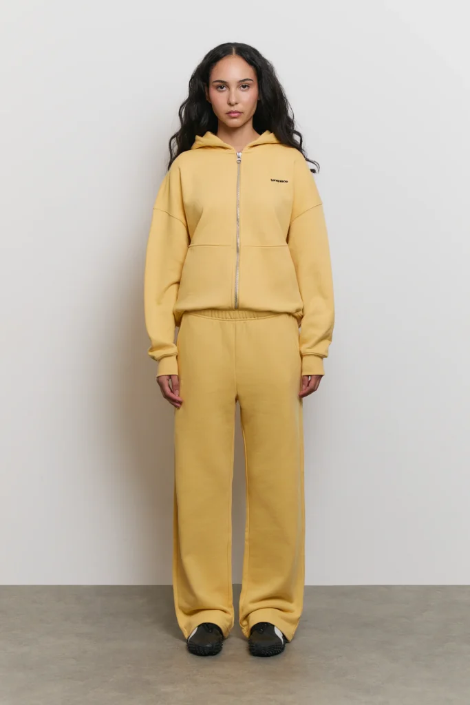 tensplace-zip-hoodie - Soigné Middle East A model image of the tensplace ZIP Hoodie