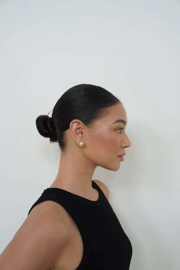 sleek-low-bunwebp - Soigné Middle East