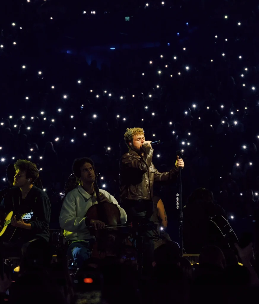 image of singer Alex Warren on stage