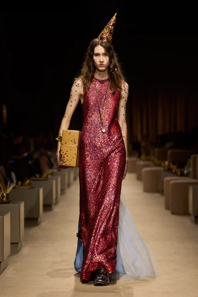 Coach-SS27-1 - Soigné Middle East Image of a model walking the Coach SS27 show