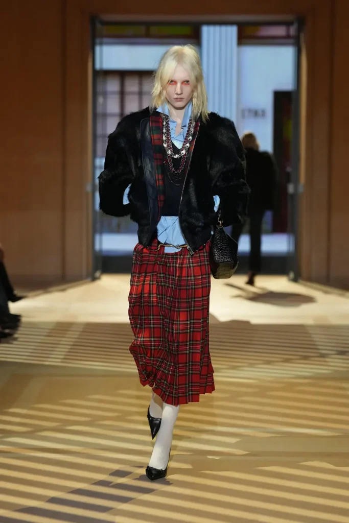 A model walking the Gucci SS27 show