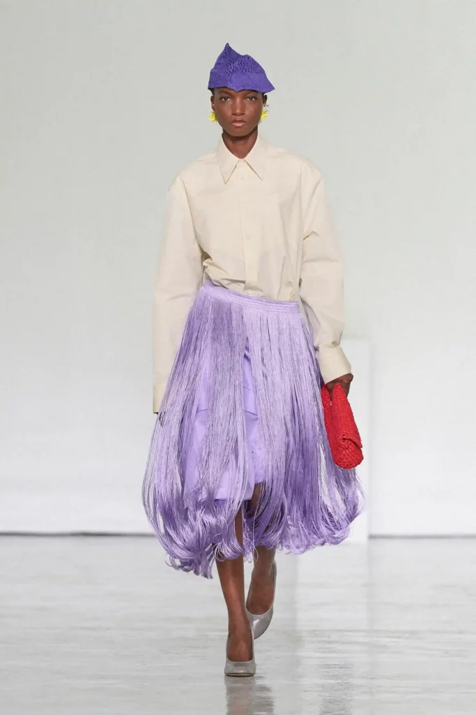 Image of a model walking the Bottega Veneta SS27 show