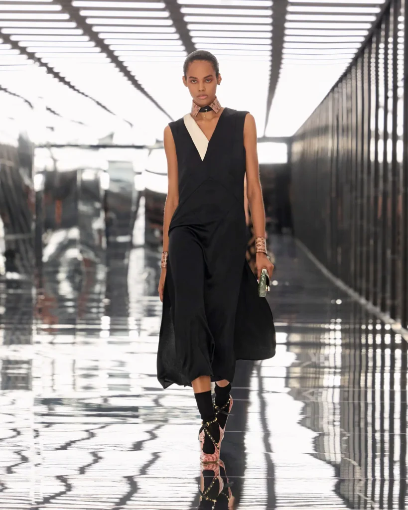 A model walking the Fendi SS27 runway