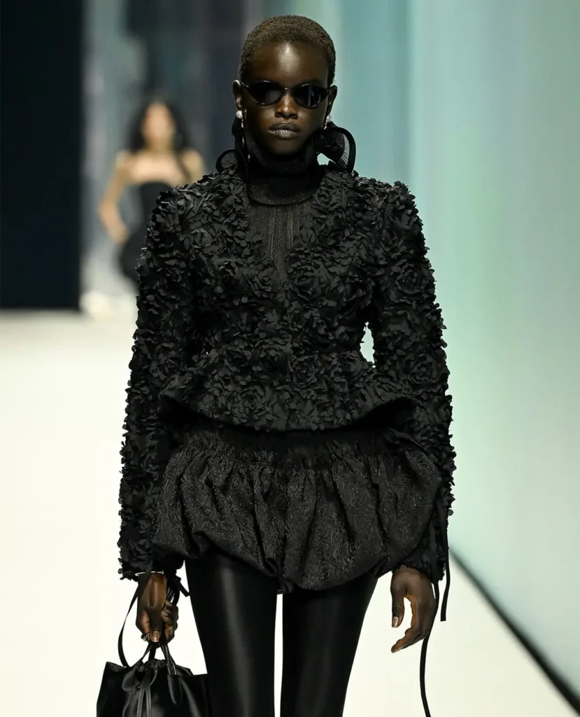 london-fashion-week-ss27-hm-2 - Soigné Middle East Image of a model walking the H&M runway show