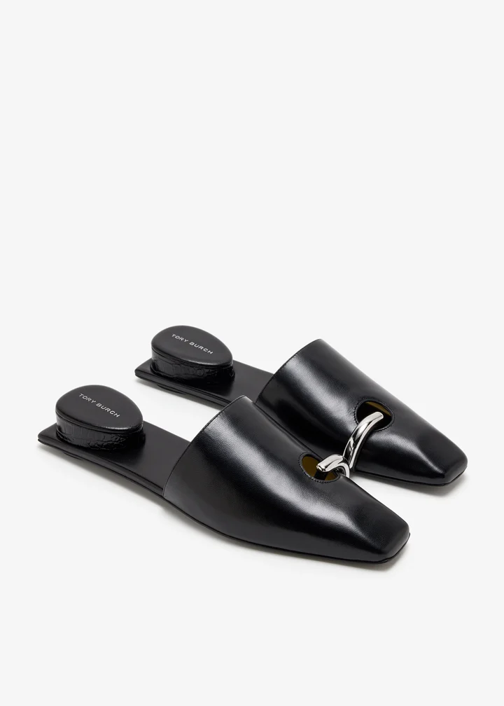 tory-burch-pierced-mules - Soigné Middle East Product image of the Tory Burch Pierced Mules