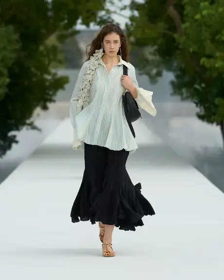 image of a model walking the Dior SS27 show