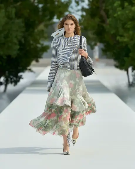 image of a model walking the Dior SS27 show